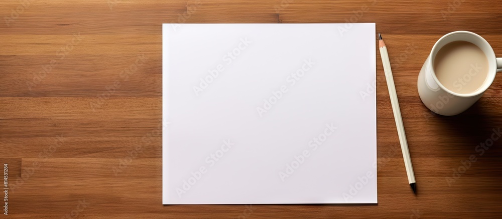 Poster Top view of a blank paper and pen on a desk with empty space for text or image. with copy space image. Place for adding text or design