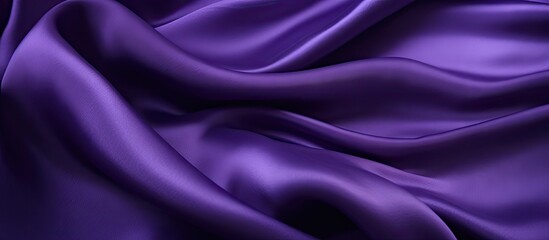Obraz premium Closeup of a violet fabric with a textured background providing ample copy space for images
