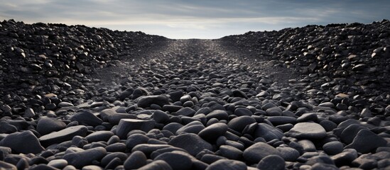 The road was made of black clay soils and small pebbles creating a sturdy and easily passable path. with copy space image. Place for adding text or design