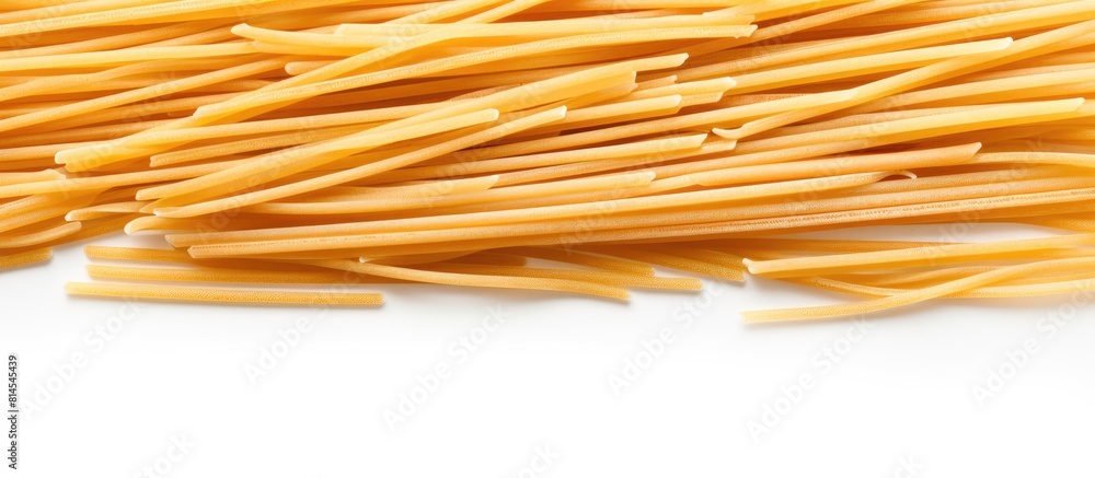 Poster close up of durum wheat spaghetti on isolated white background providing ample copy space for text