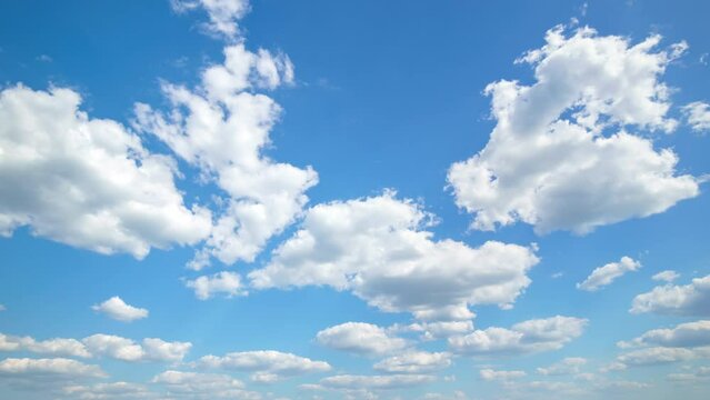 beautiful blue sky with soft white clouds timelapse for abstract background
