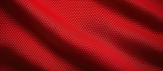 The red sport fabric texture can be seen in this copy space image