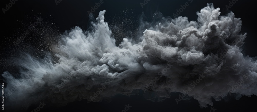 Poster an abstract image capturing the frozen motion of black powder exploding or being thrown against a ba