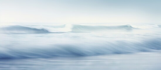 A picturesque beach scene captured through long exposure photography showcasing the captivating motion of the waves The serene seascape creates an abstract background perfect for incorporating copy s