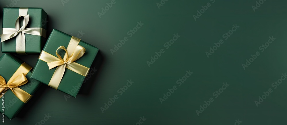 Poster Top view of three handcrafted gifts arranged on a green background with copy space available for your text