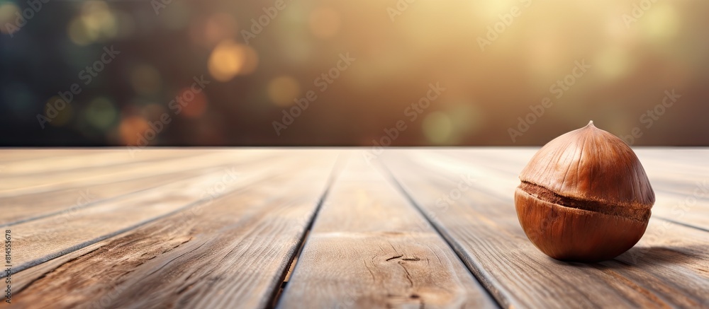 Poster a healthy concept showcasing a hazelnut placed on a wooden background with ample copy space for addi