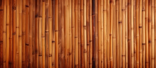 Fototapeta premium A copy space image of a vintage bamboo texture with a warm brown tone ideal for use as a background 136 characters