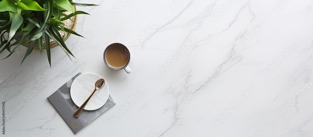 Poster The office desk table made of white marble is minimally adorned with office supplies and a smartphone The top view presents a flat lay composition with ample copy space for additional elements