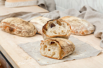 Homemade Italian bread cut on the table
