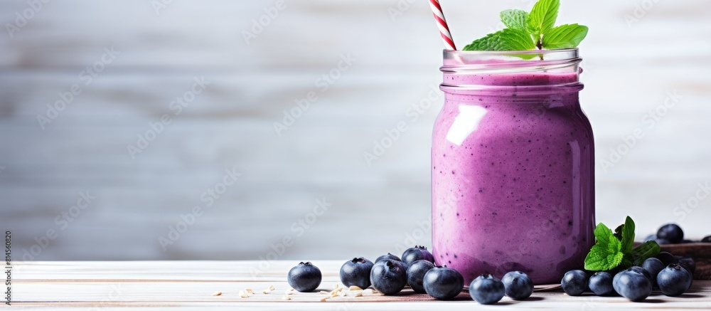 Aufkleber A fresh blueberry smoothie is presented in a Mason jar on a white table creating a visually appealing copy space image that represents the concept of a refreshing beverage