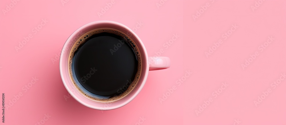 Aufkleber a black coffee cup is seen from above on a pink background with ample space for additional imagery o