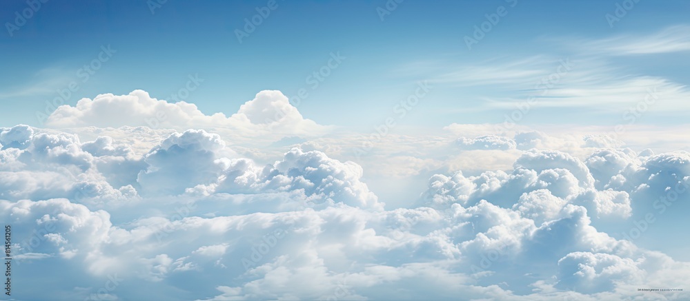 Aufkleber Aerial view of the cloudy sky with a large expanse of fluffy clouds The image provides ample empty space for potential copying or text insertion
