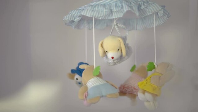 Musical mobile in action. Memories from childhood. Development of the vision of the baby. The child sees sweet dreams. Moving vivid colars parts recommended for the eye tracking skills development.