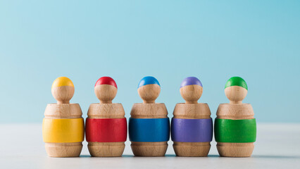 Educational wooden toy. Colored dwarfs in barrels. Early childhood development.