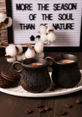Interior candles in beautiful coffee mugs