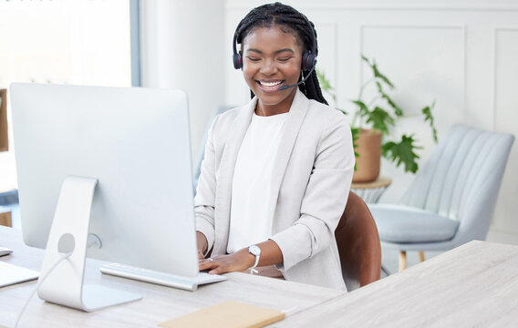 Typing, advisor or black woman in telemarketing call center consulting or communication for loan advice. Finance business, customer support or virtual assistant talking on computer online in office
