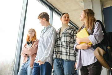 group of young college students in classroom