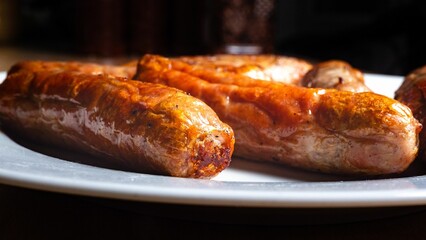 Breakfast Sausage Dish Delicious Grilled Food on a White Plate
