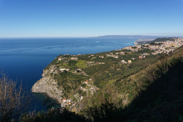 View over the city at mediterranean coast from Monte Sant'Elia viewpoint during daytime, Palmi,...