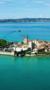 Scaliger Castle wide Lake Grada view Italy on vertical video.