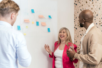 Collaborative brainstorming session in modern coworking space