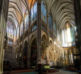 Naklejka premium a church with an interior full of windows and altars