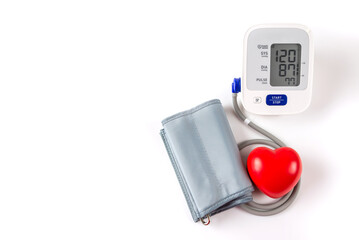 tonometer and red heart on a white background with copy space.