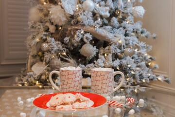 Cozy Holiday Vibes: Hot Chocolate and Cookies by the Christmas Tree