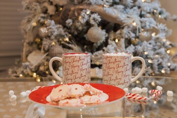 Cozy Holiday Vibes: Hot Chocolate and Cookies by the Christmas Tree