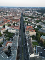 Aerial view of a bustling city street showing the buildings and roads below