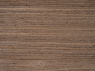 Graceful waves of walnut create a harmonious symphony of dark browns and subtle auburn in this...