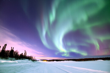 Aurora borealis over snowy road - aurora borealis stock video & royalty-free footage