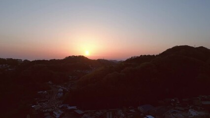 Drone video of Sunset on the Seto Inland Sea near Matsuyama in Japan.