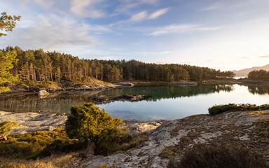 A phenomenal golden hour sunset in Norway over the bay and fjords of Stord and the surrounding area