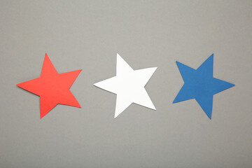 American independence day, celebration, patriotism and holidays concept - red, white and blue paper...