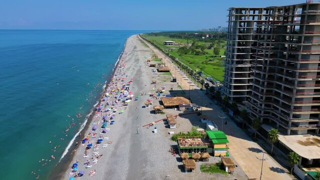 Drone footage of Gonio Beach and coastal under construction building in Gonio, Georgia