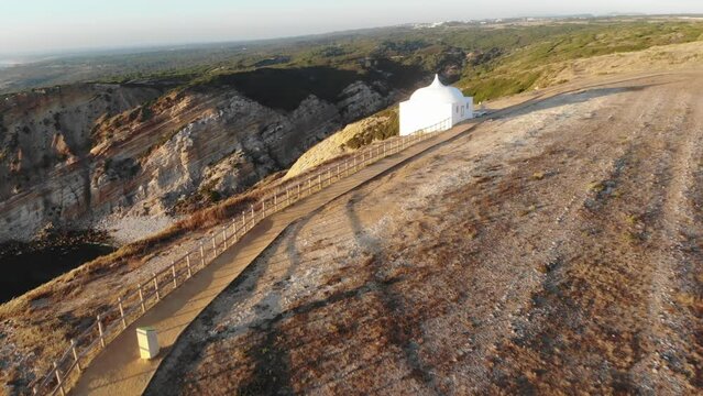Drone footage of Ermida da Memoria (Hermitage of Memory) Chapel in Quinta do Conde, Portugal