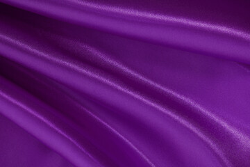 Dark purple fabric texture background, detail of silk or linen pattern.