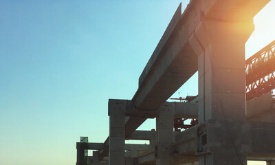 Onsite construction of sky expressway show main girder support structure with clear summer blue sky...