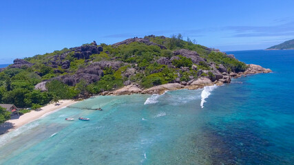 Grand Sister Island close to La Digue, Seychelles. Aerial view of tropical coastline on a sunny day