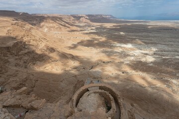 Aerial view of Masada showcasing a vast desert landscape