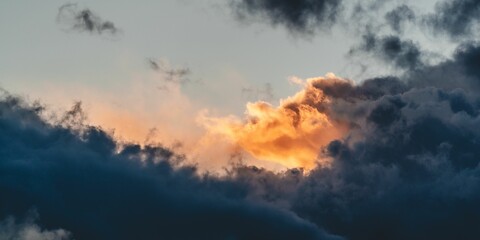 Stunning view of a vibrant sunset sky filled with clouds in the background