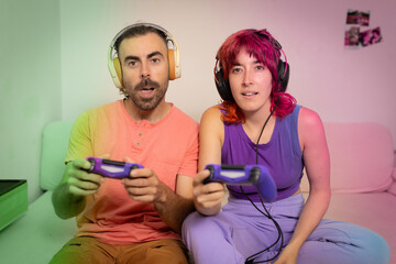 A man and a woman are playing a video game together