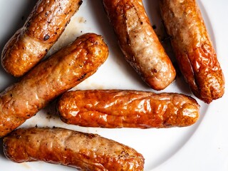 Breakfast Sausage Dish Delicious Grilled Food on a White Plate