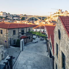 View of Porto city and the famous Dom Luis I bridge, Portugal. Photo taked from WOW dictrict in Vilanova de Gaia.