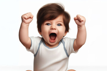 Baby with fists raised in triumph, mouth wide open, against a white background
