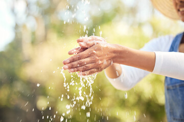 Woman, outdoor and water for washing hands in nature for germs, health care and sanitation for...