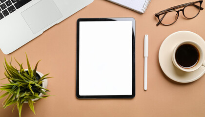 A blank tablet on the working table top view