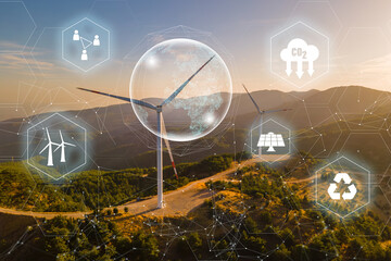 Wind turbine farm and green renewable energy worker interface. Concept of sustainability development by alternative energy