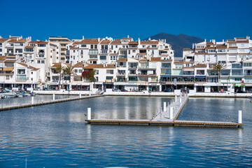 Marbella, Spain - April 7, 2023: The beautiful port of Puerto Banus on a clear sunny day